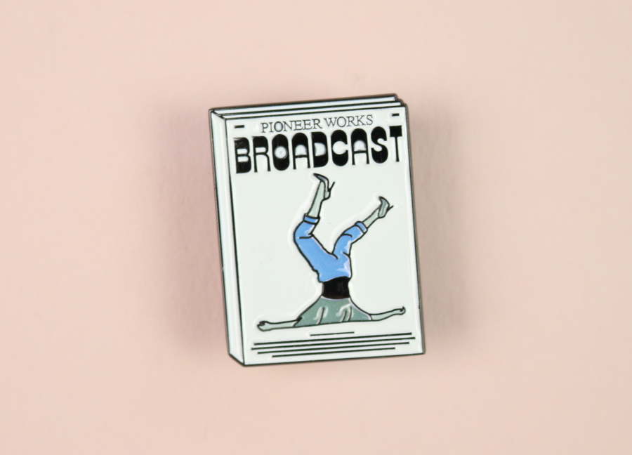 Broadcast magazine pin badge